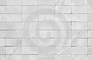 White or gray tiles ceramic wall and floor, marble abstract background. Design geometric mosaic texture decoration of the bedroom