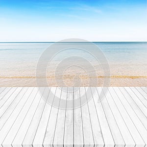 White gray wooden floor ,sea and blue sky background. Summer on
