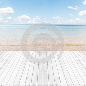 White gray wooden floor ,sea and blue sky background. Summer on