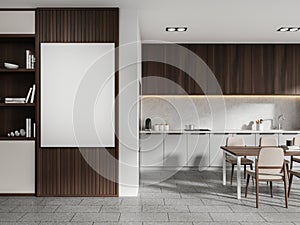 White, gray and wooden kitchen with dining table and poster