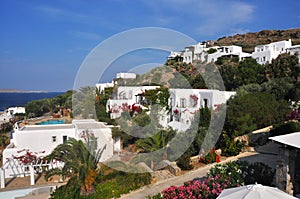 White greek private houses on a hill of mykonos island