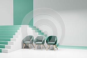 White and green living room corner with armchairs and stairs