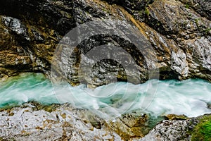 white green rushing water during a canyon with rocks in a gorge