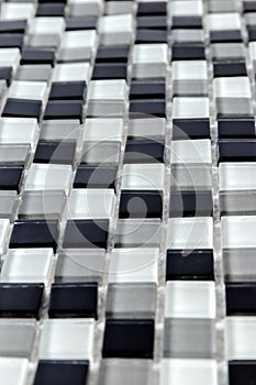 White, Grey and black ceramic mosaic wall tiles texture for bathroom, abstract background for copy space, side view