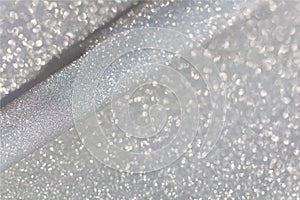 White and grey  glitter bokeh circle glow  blurred and blur abstract. Glittering shimmer bright luxury.