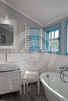 White grey rustic bathroom with window