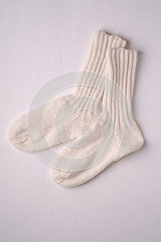 White handmade warm knitted wool socks pair for cold winter