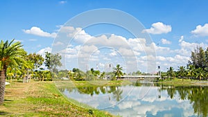 White hanging bridge of Nong Prajak Park and blue sky with clouds,
