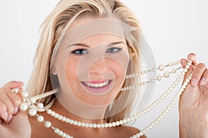 White healthy teeth and pearls