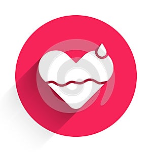 White Heart heal icon isolated with long shadow. Red circle button. Vector Illustration