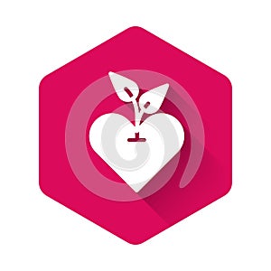 White Heart icon isolated with long shadow. First aid. Healthcare, medical and pharmacy sign. Pink hexagon button