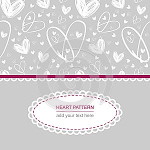 White heart pattern on grey background with white label and text