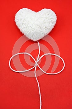 White heart shape made from wool