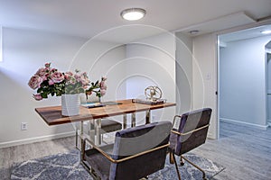 White home office with chrome and wood desk