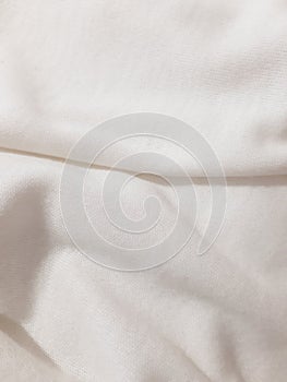 White home soft fabric with folds. Background design, photography. Textile, fabric template, modern new