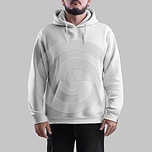 White hoodie mockup on bearded man, oversized sweatshirt with pocket, for design, branding, front view