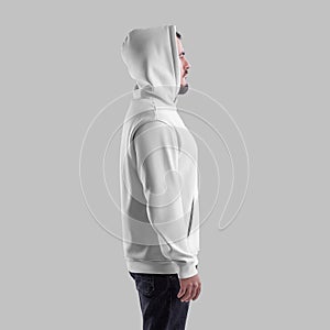 White hoodie template oversize on bearded man in hood, side, apparel with pocket, laces, label, isolated on background