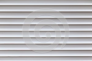 White horizontal lines of a Persian Window Blinds