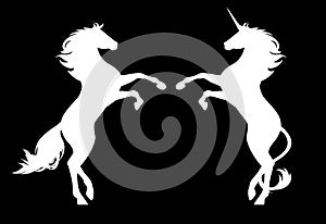 White horse and unicorn standing vector silhouettes