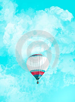 White hot air balloon floating over fuzzy clouds in sunny turquoise sky.