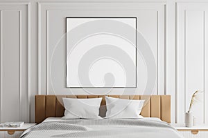 White hotel bedroom interior with bed and decoration. Mockup frame