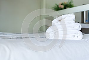 White hotel towel on bed,Stack of fluffy bath towels