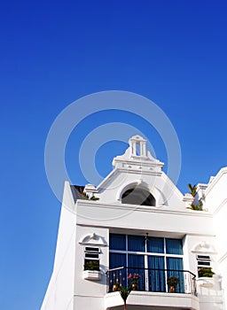 White house, blue tropical sky