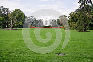 The White House and fences with Restricted Area sign in Washington DC.