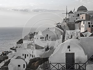 White houses, churches and blue domes in Oia village