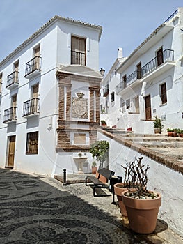 White houses of small Andalusian town Frigiliana in southern Spain photo