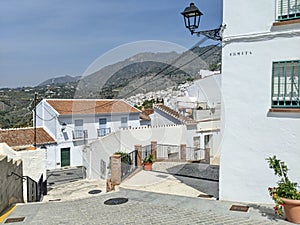 White houses of small Andalusian town Frigiliana in southern Spain photo
