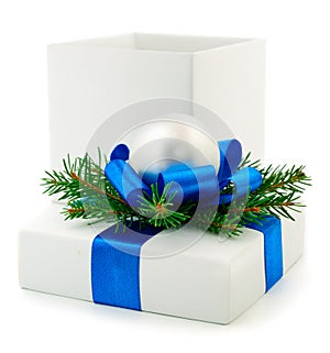 White Ñhristmas gift box with blue ribbon
