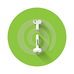 White Human broken bone icon isolated with long shadow. Green circle button. Vector