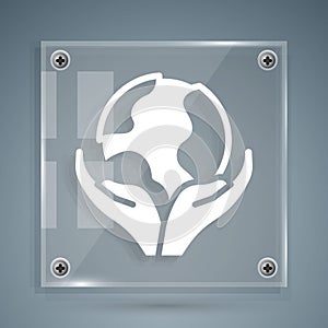 White Human hand holding Earth globe icon isolated on grey background. Save earth concept. Square glass panels. Vector