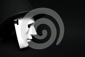 White human mask in hat