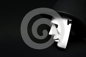 White human mask in hat