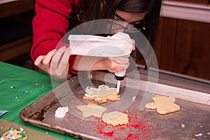 White icing on a snowflake Sugar cookie on a baking tray