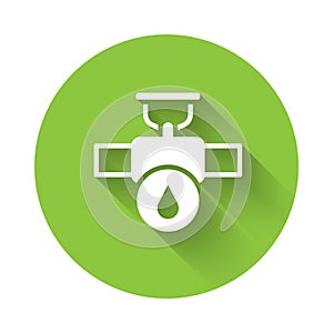 White Industry metallic pipe and valve icon isolated with long shadow background. Green circle button. Vector