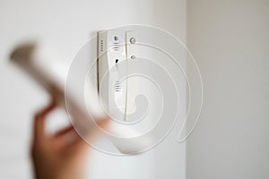 white intercom on the wall