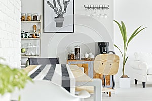 White interior with wooden table