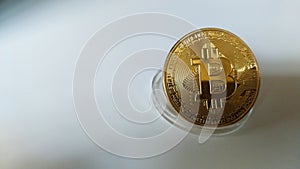 White isolated crypt bitcoin with empty photocopy space.