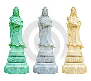 White, ivory and green statues of Guanyin hold a vase of holy water