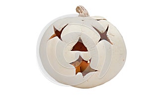 White jack o'lantern with lit candle