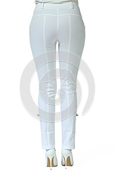 White jeans trousers on model legs with white stiletto heels