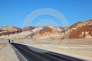 White Jeep on a high-speed highway