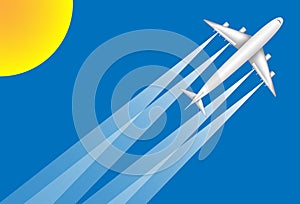 A white jet airplane flying to a holiday destination on a blue sky background in the sun shine.