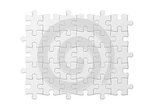 White jigsaw puzzle. Blank simple background.