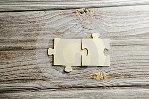 White jigsaw puzzle connecting together. Team business success partnership or teamwork concept. A group of business people