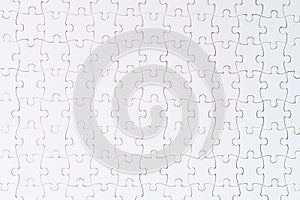 White jigsaw puzzle. Copy Space Isolated on White Background