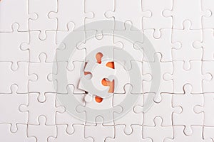 White jigsaw puzzle game texture incomplete or missing piece